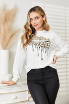 Sleek and Stylish Graphic Round Neck Sweatshirt Trendsi