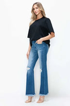 Sleek and Stylish Full Size Raw Hem Distressed High Rise Bootcut Jeans Trendsi
